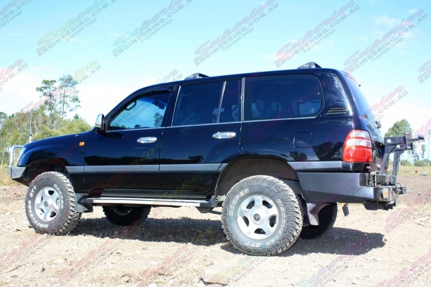Left side view of a Toyota Landcruiser 100 Series fitted with 2" inch airbag man lift kit