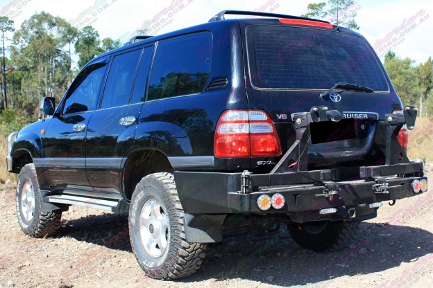 Rear end view of a Toyota Landcruiser 100 Series IFS fitted with 2" inch lift kit with Airbag Man coil helpers