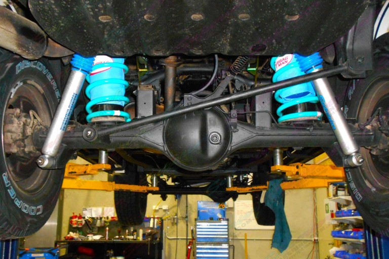 Underside view of the Nissan Patrol fitted with airbags, coils and nitro gas shocks
