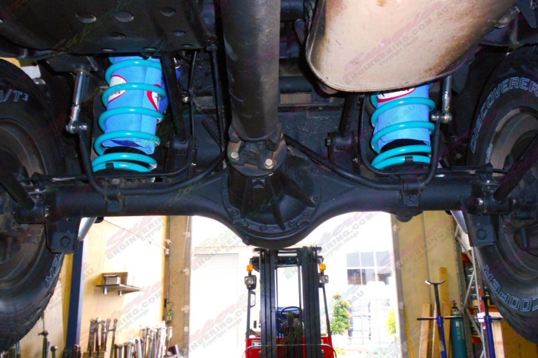 Underside view of the Nissan Patrol fitted with airbags, coils and swaybar extensions