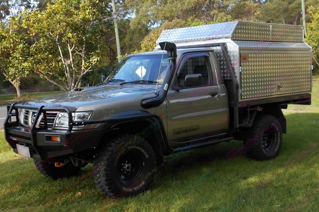 Nissan Patrol GU Ute fitted with a 3 Inch Profender Airbag Lift Kit