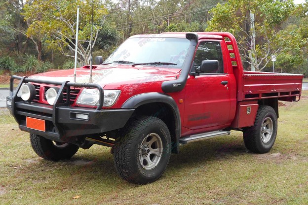 Front left side view of a Nissan Patrol GU Ute after being fitted with a 2 Inch Bilstein and Airbag Man Airbag Lift Kit
