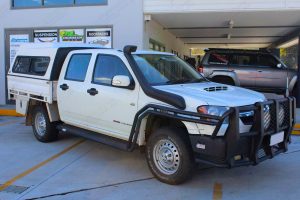 Front right side view of a Holden Colorado (dual cab) fitted with a 40mm Bilstein lift kit and AirBag Man air suspension helper kit